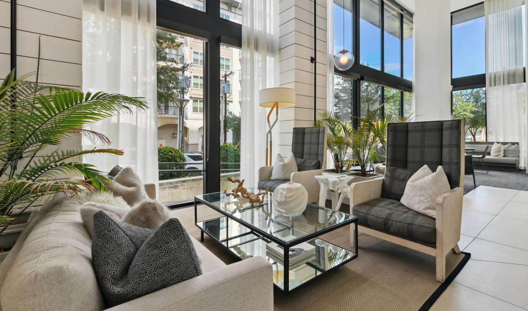 a living room with a glass door